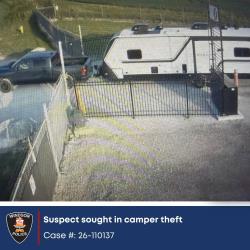 2026-10-10-update-01-vis2 Image of dark pickup truck and large white camper.